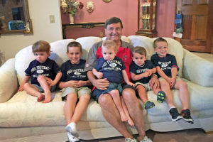 Greg Stevens celebrating his birthday with a visit from his five grandsons.